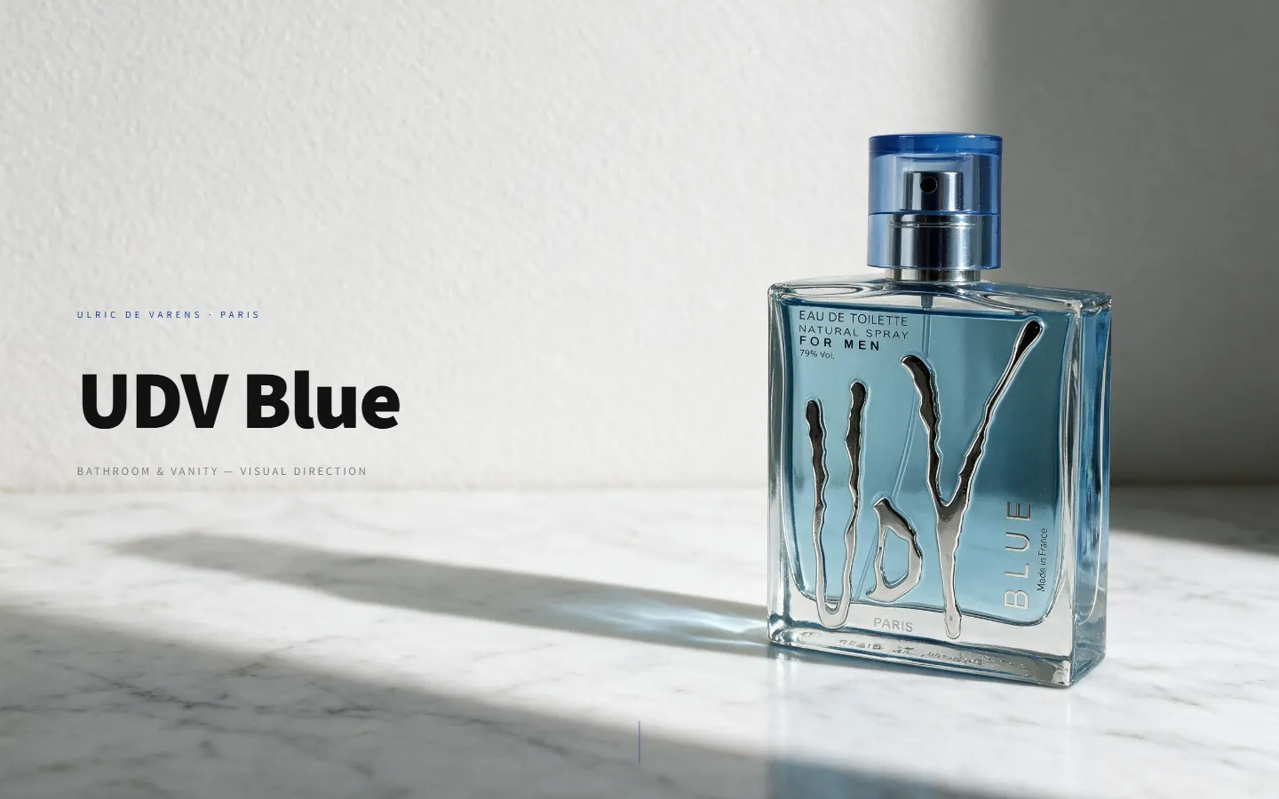 UDV Blue Lookbook cover: the blue bottle in raking morning light on white marble, under 'Bathroom & Vanity — Visual Direction'.
