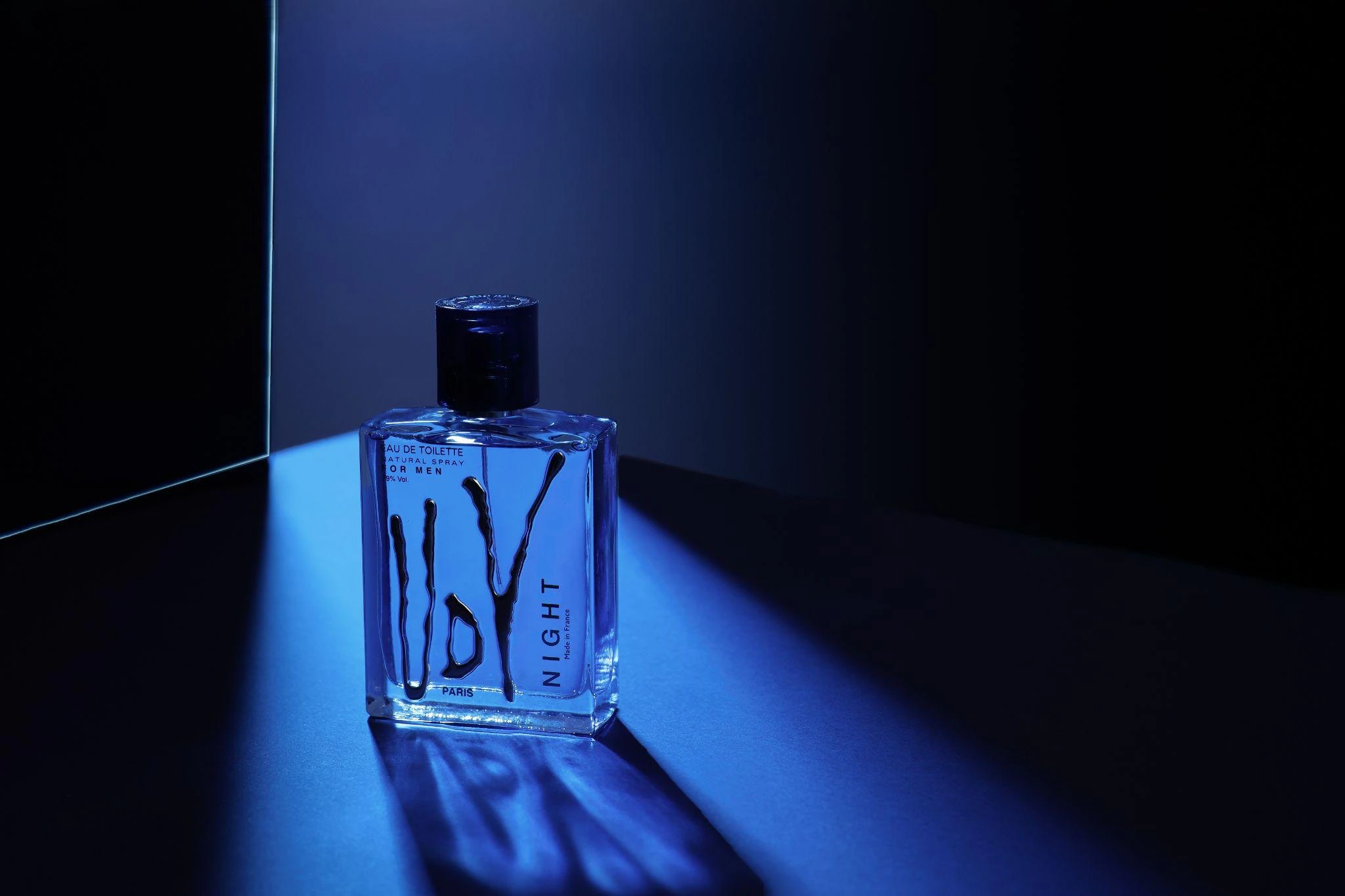 UDV Night bottle under blue light