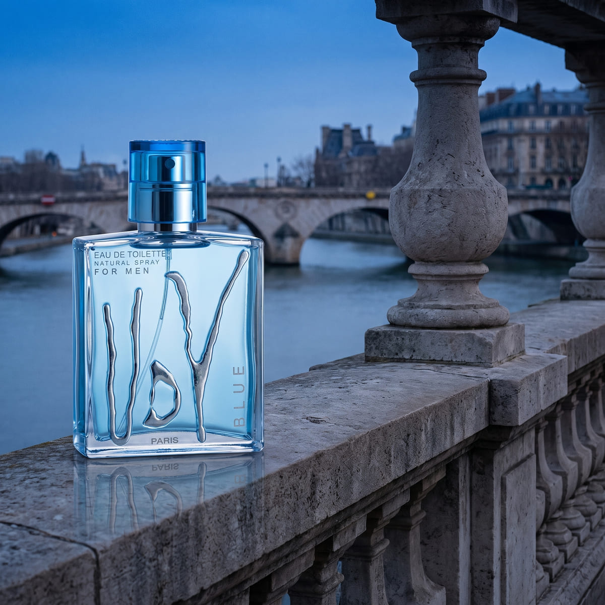 UDV Blue eau de toilette against a riverside balustrade above the Seine at blue hour.